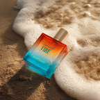 Rayhaan Tropical Vibe Eau de Parfum 100ml angled bottle beside sea foam