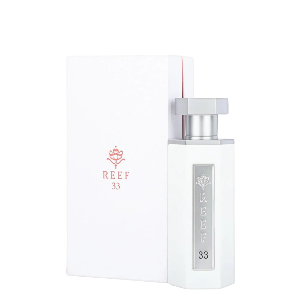 White perfume bottle with 'REEF 33' branding on a white background