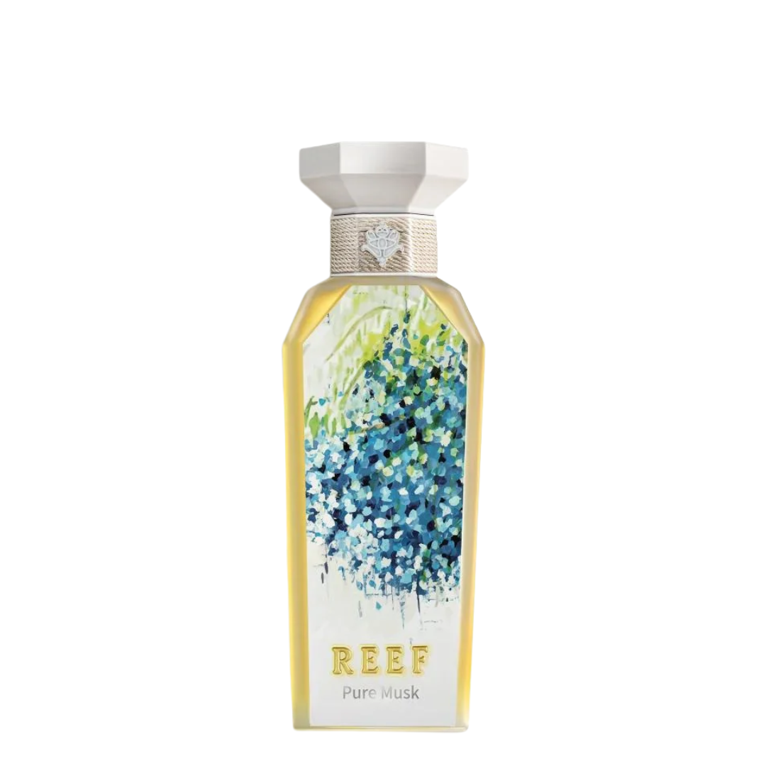 Reef Pure Musk perfume bottle with floral design on a white background