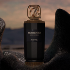 Riiffs Momento Extrait de Parfum 100ml bottle in a rocky setting