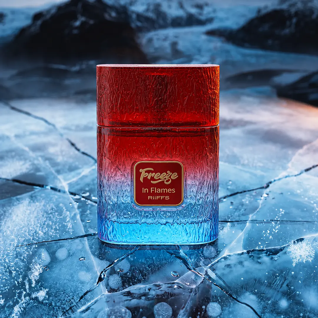 A rectangular perfume bottle labeled 'Freeze In Flames RiiFFS' with a red-to-blue gradient design, set against a dramatic icy mountain landscape.
