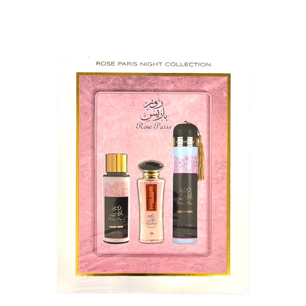 A 3-piece Rose Paris perfume gift set by Ard Al Zaafaran, including a bottle of perfume, a spray bottle, packaged in a pink box with floral designs.