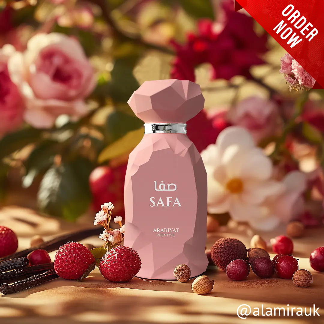 Pink bottle labeled 'SAFA' with flowers and fruits in the background. Safa by Arabiyat Prestige Womens Perfume