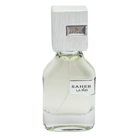 Perfume bottle labeled 'SAHEB' with a white cap on a white background. Ard Al Zaafaran. Clone / dupe of Imagination by Louis Vuitton.