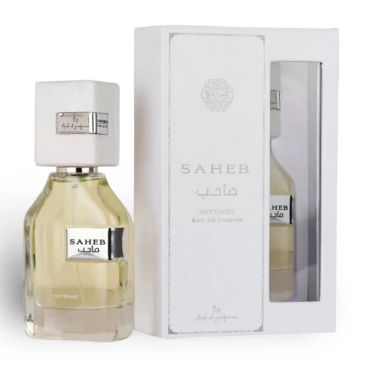 Perfume bottle and packaging with 'SAHEB' branding on a white background. Ard Al Zaafaran. Clone / dupe of Imagination by Louis Vuitton.