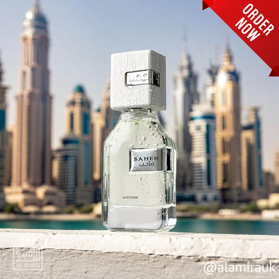 Perfume bottle labeled 'SAHEB' with a city skyline in the background. Ard Al Zaafaran. 