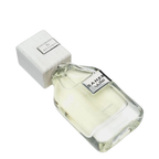Saheb Intense Arabian perfume bottle lying on its side, showcasing modern design and premium mens fragrance qualities.