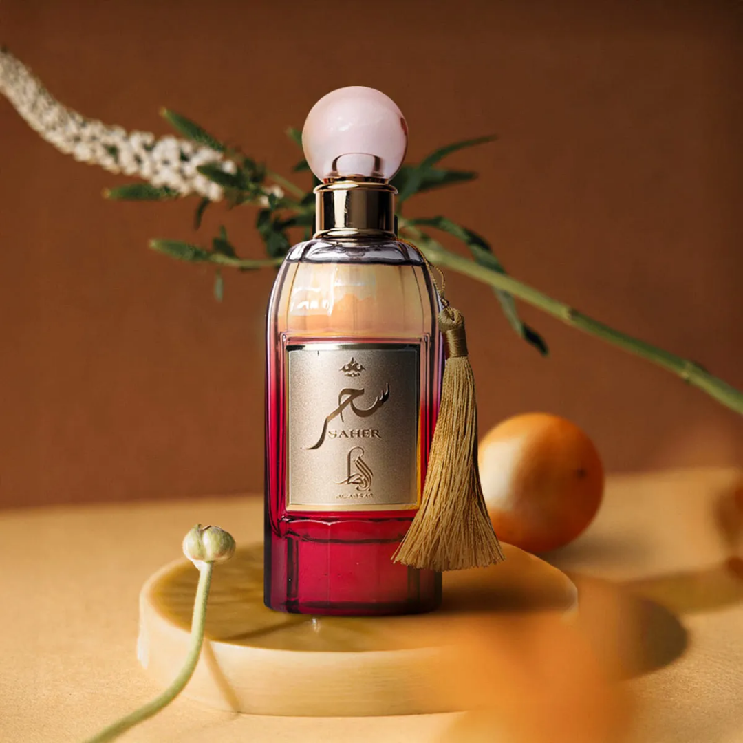 Perfume bottle with decorative elements on a warm-toned background. Saher by Al Absar Womens Perfume