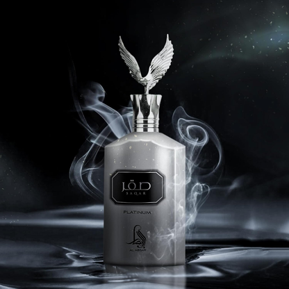 Perfume bottle with a decorative winged cap on a dark background