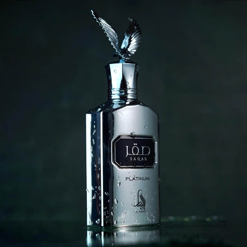 Silver bottle with decorative cap on a dark background