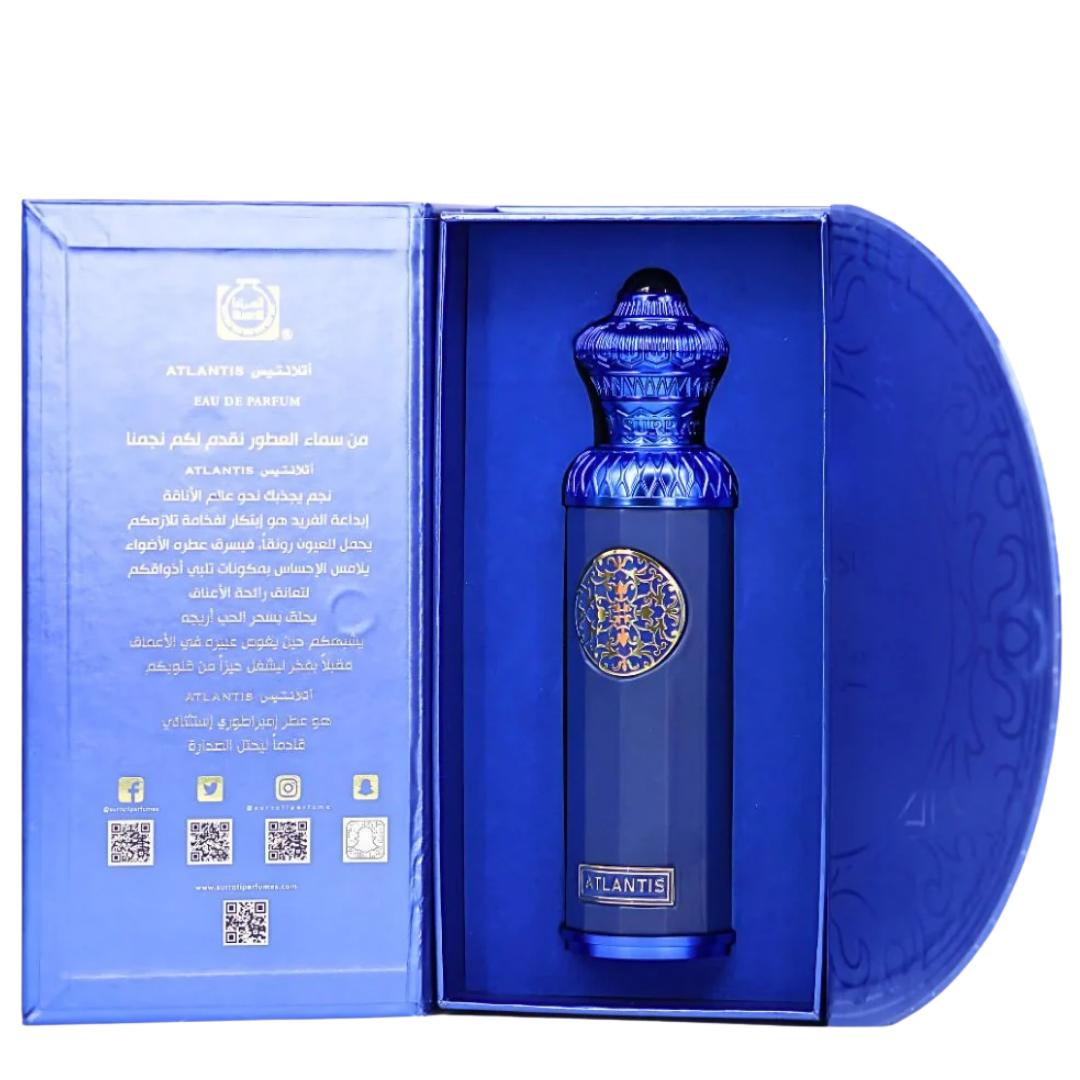 Blue perfume bottle with intricate design in a matching box on a white background. Surrati Atlantis 140ml EDP Unisex Perfume