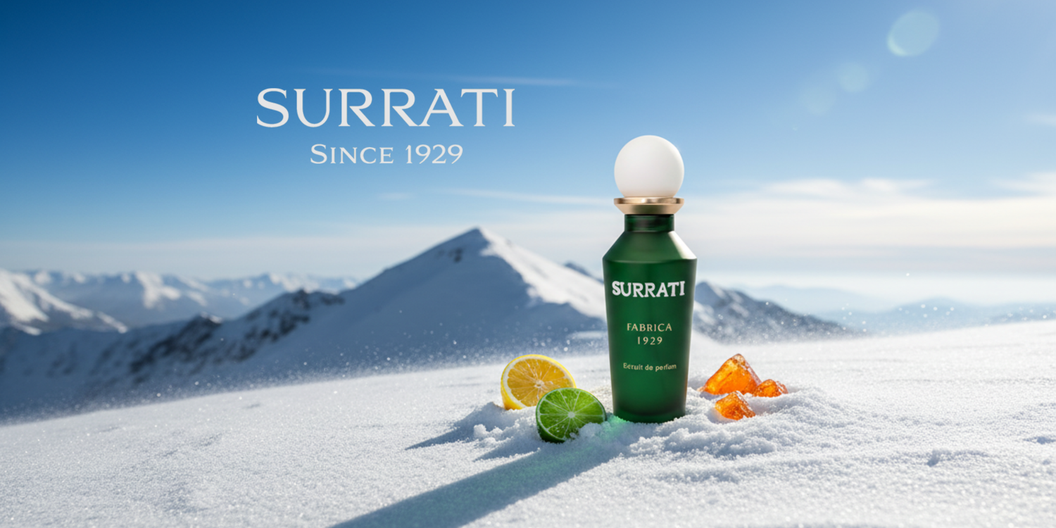 Surrati bottle with fruit on a snowy mountain landscape