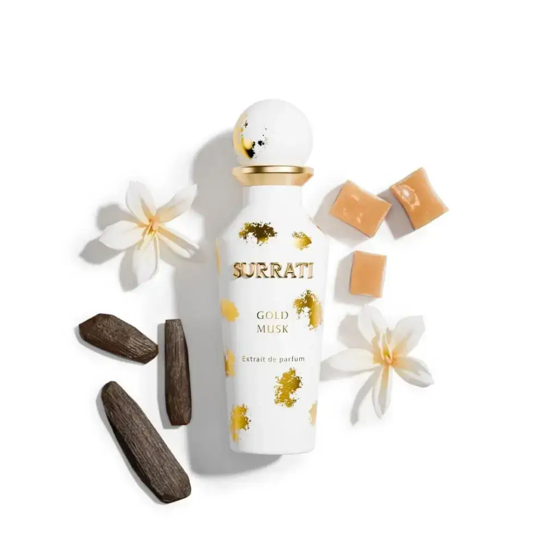 Surrati Gold Musk perfume bottle with flowers and incense on a white background