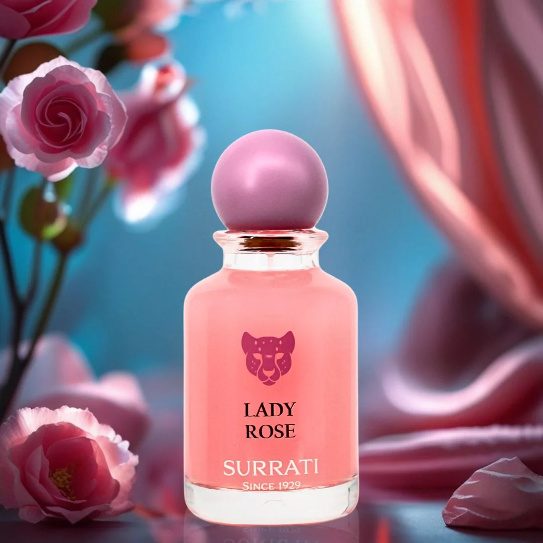 Pink Surrati Lady Rose perfume bottle with pink roses in the background