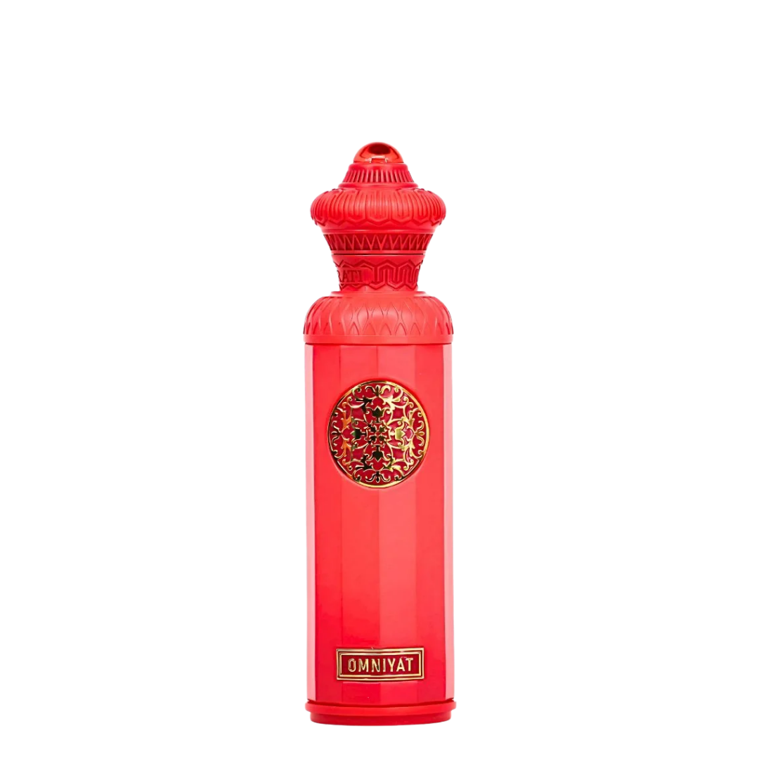 Red bottle with intricate design and 'OMNIYAT' branding on a white background. Surrati Omniyat Unisex Perfume