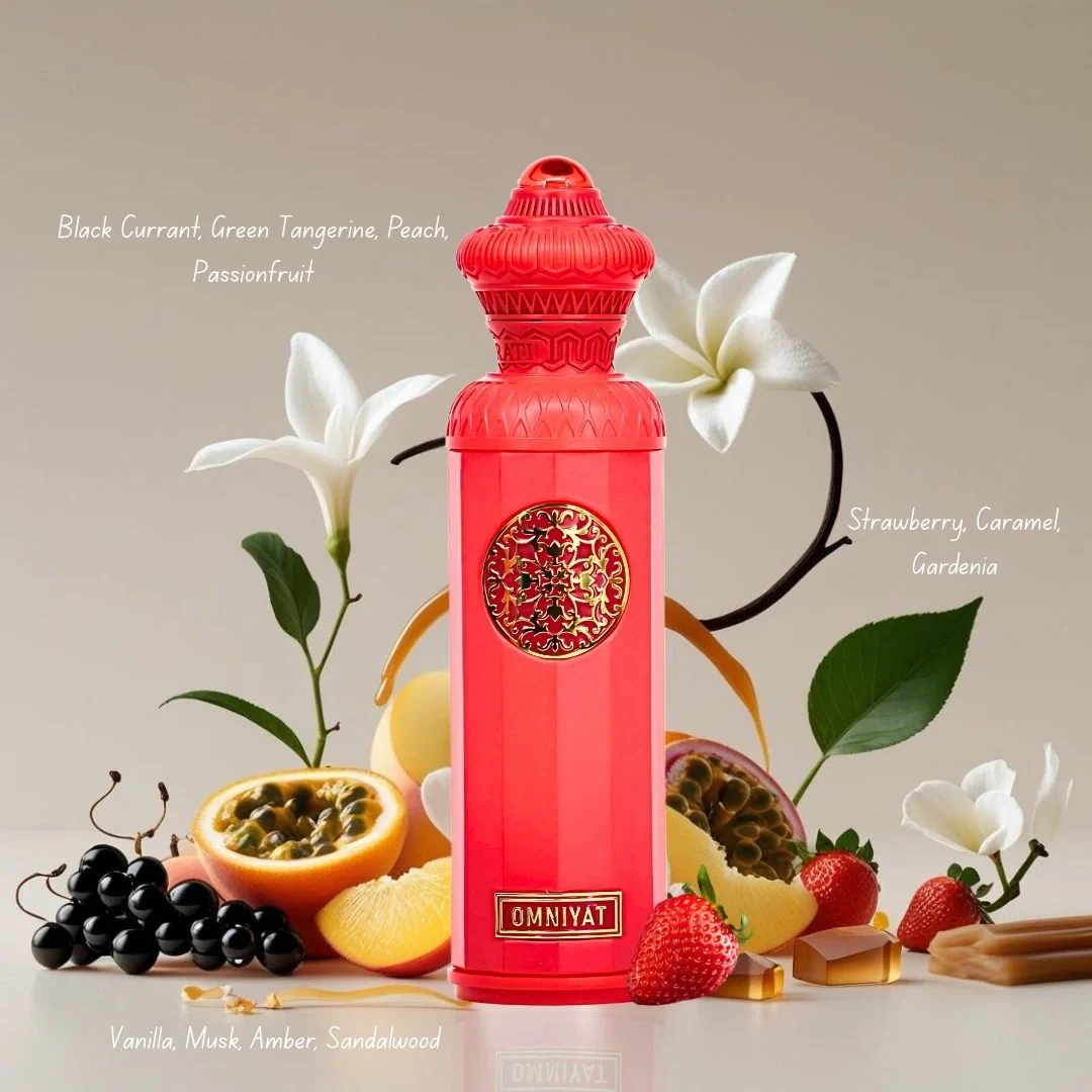 Red bottle with floral and fruit elements on a neutral background. Surrati Omniyat Unisex Perfume