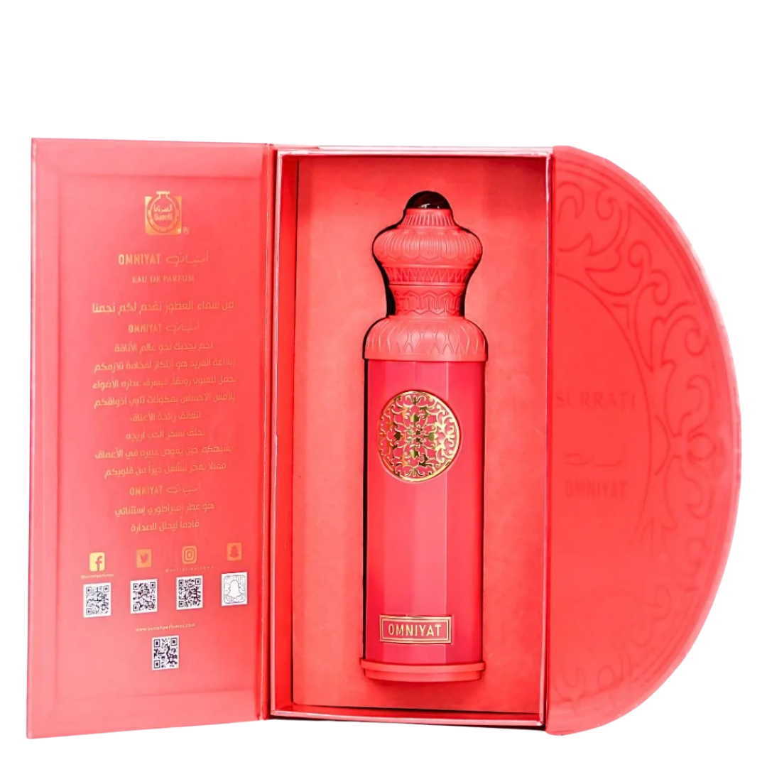 Red bottle with gold accents in a decorative box on a white background. Surrati Omniyat Unisex Perfume