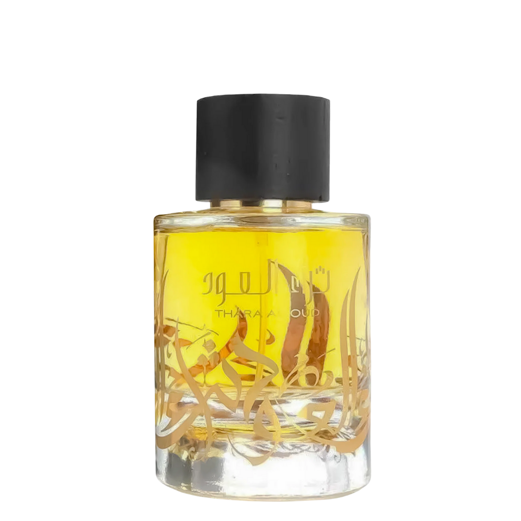 A clear glass bottle of Thara Al Oud perfume with a black cap and visible liquid inside, labeled with the brand name and product details.