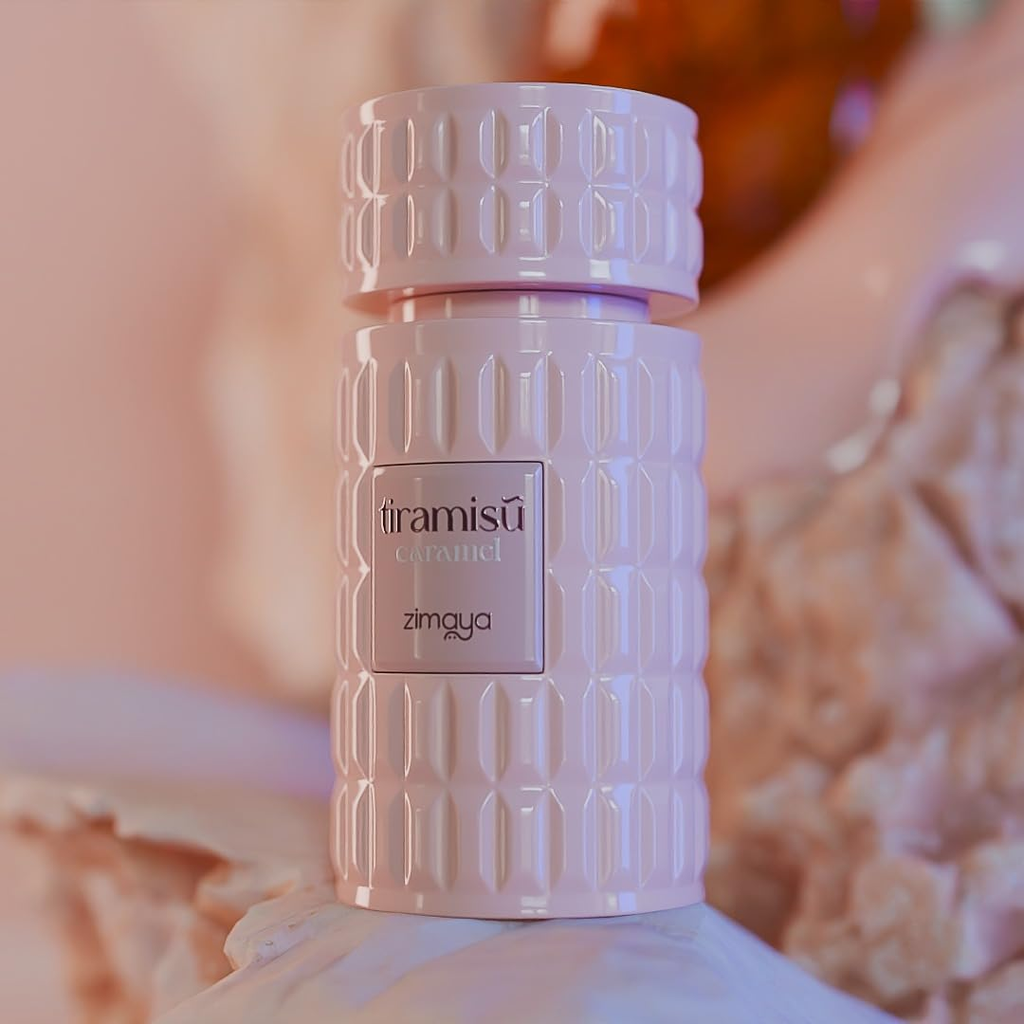 Pink textured bottle labeled 'tiramisu caramel' by 'zimgya' on a soft focus background.