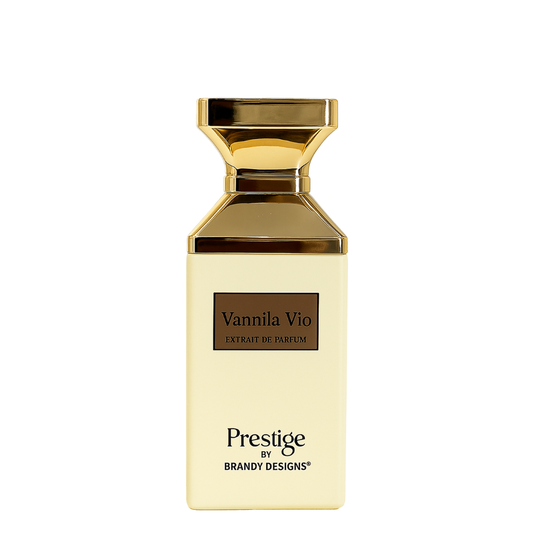 Gold and beige perfume bottle labeled 'Vannila Vio' by Prestige by Brandy Designs on a white background