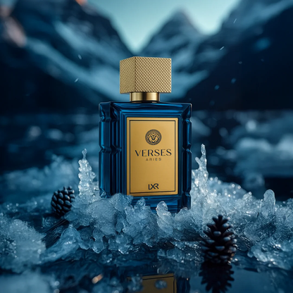 Verses perfume bottle with gold cap on a snowy mountain background. Verses Aries by LXR Mens Perfume
