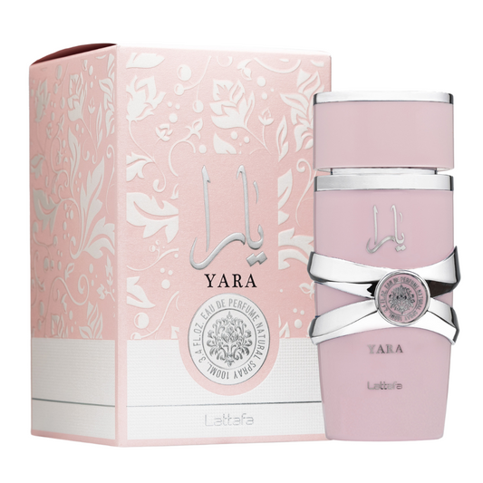 A bottle of Yara Eau de Parfum by Lattafa, featuring a pink hue with a silver-colored cap and label design. Clone / dupe of / inspired by Dior - Poison Girl womens fragrance. Lattafa Yara Eau de Parfum 100ml bottle and pink floral embossed box with silver Arabic calligraphy, feminine fragrance with sweet, vanilla, and tropical accords.