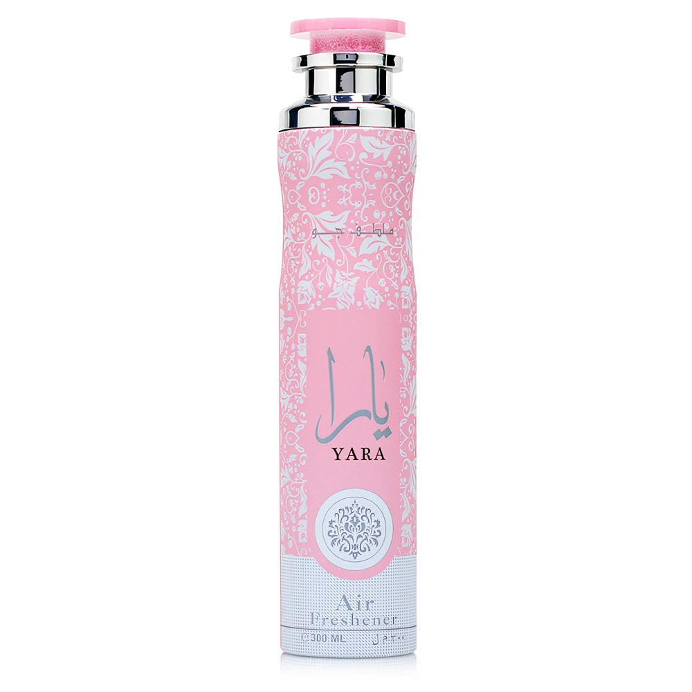 A bottle of Yara Eau de Parfum by Lattafa, featuring a pink hue with a silver-colored cap and label design. 