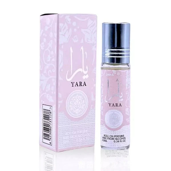 A bottle of Yara Eau de Parfum by Lattafa, featuring a pink hue with a silver-colored cap and label design. 