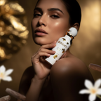 Model holding the Surrati Gold Musk perfume bottle.