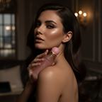 Model holding the Surrati Miss World perfume bottle.